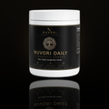 Nuvori Daily Longevity Greens jar on obsidian background
